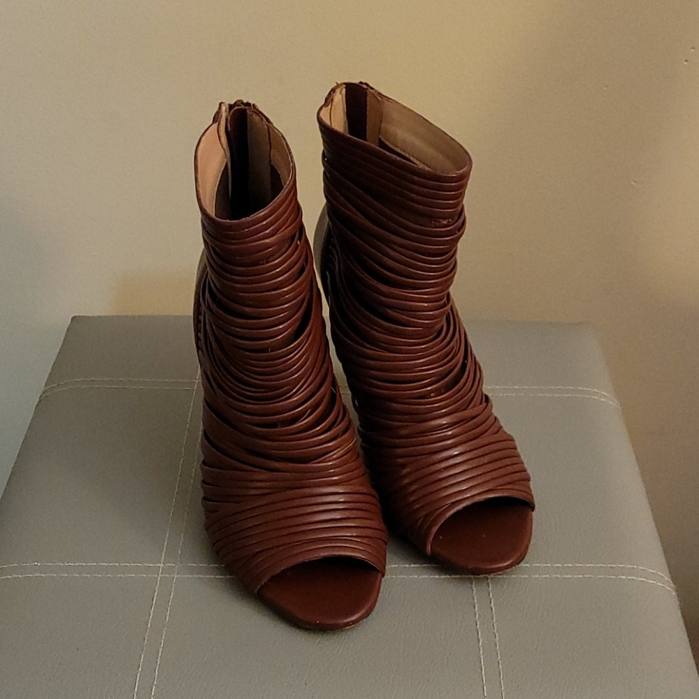 Peep toe ankle boots with back zipper.